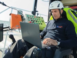 A professional performs forklift maintenance